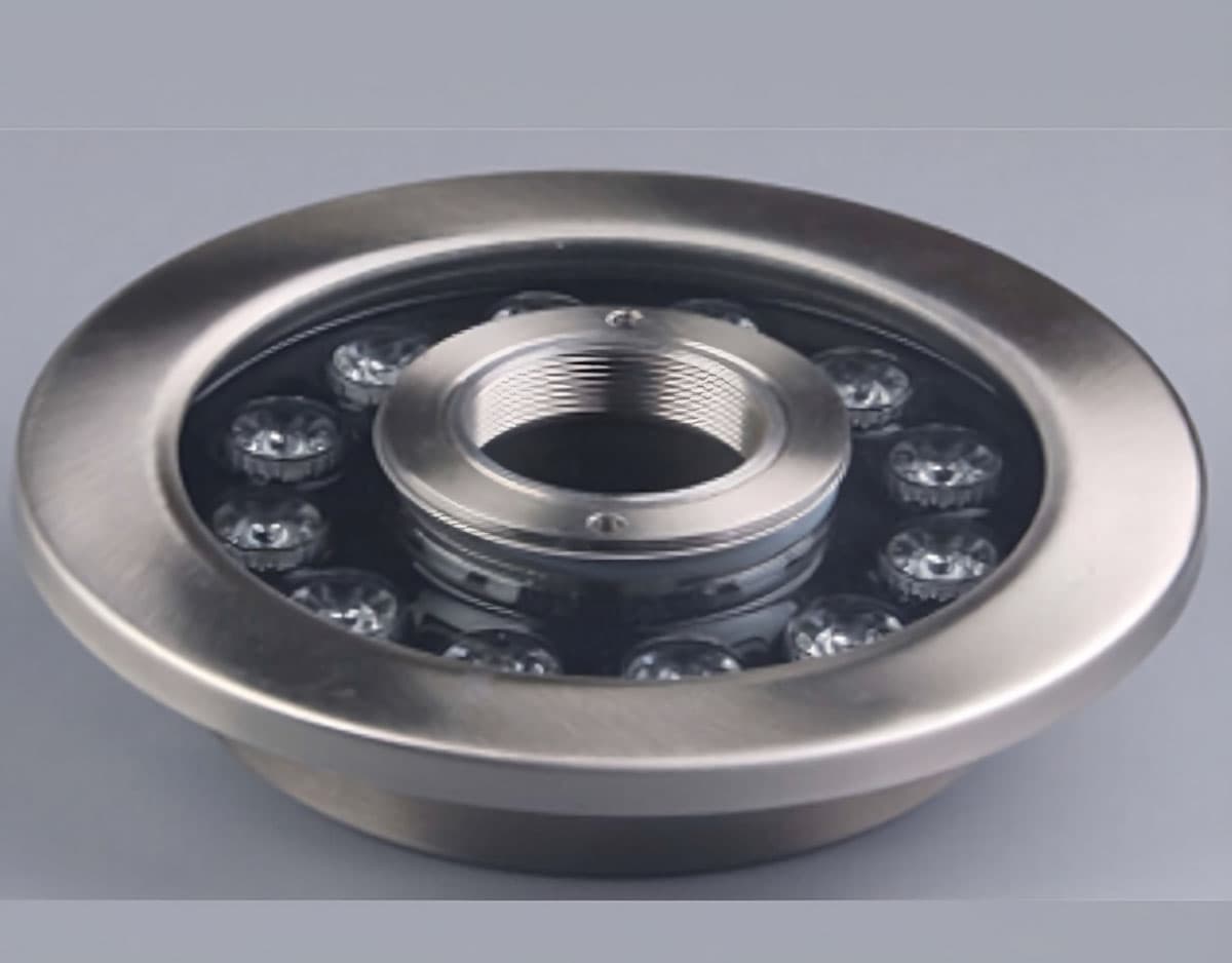 Faretto LED subacqueo circolare modello FLM12 in acciaio inox per illuminazione fontane e piscine.