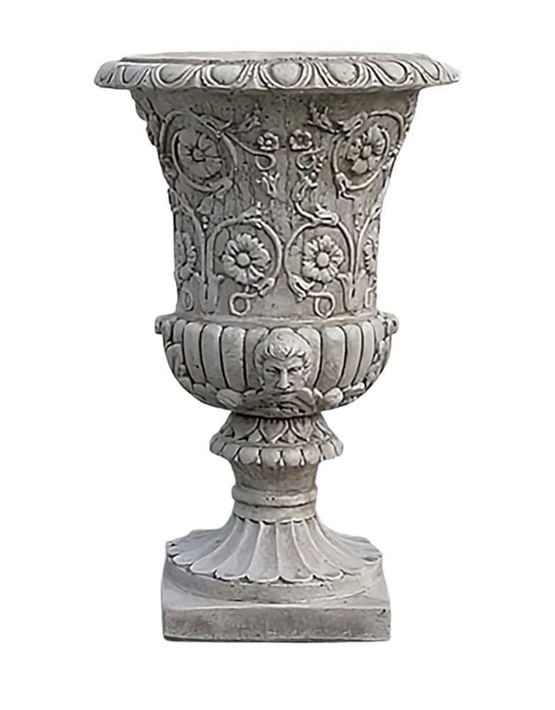 Vaso ornamentale da giardino in finitura color tufo con fregi e volti a rilievo.